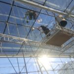 5 monteren op hoogte amsterdam door abseiltechnieken